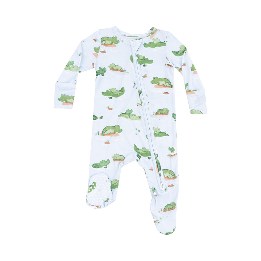 light blue baby footie with green alligators all over the footie. mommy alligator and baby alligators on the footie. 