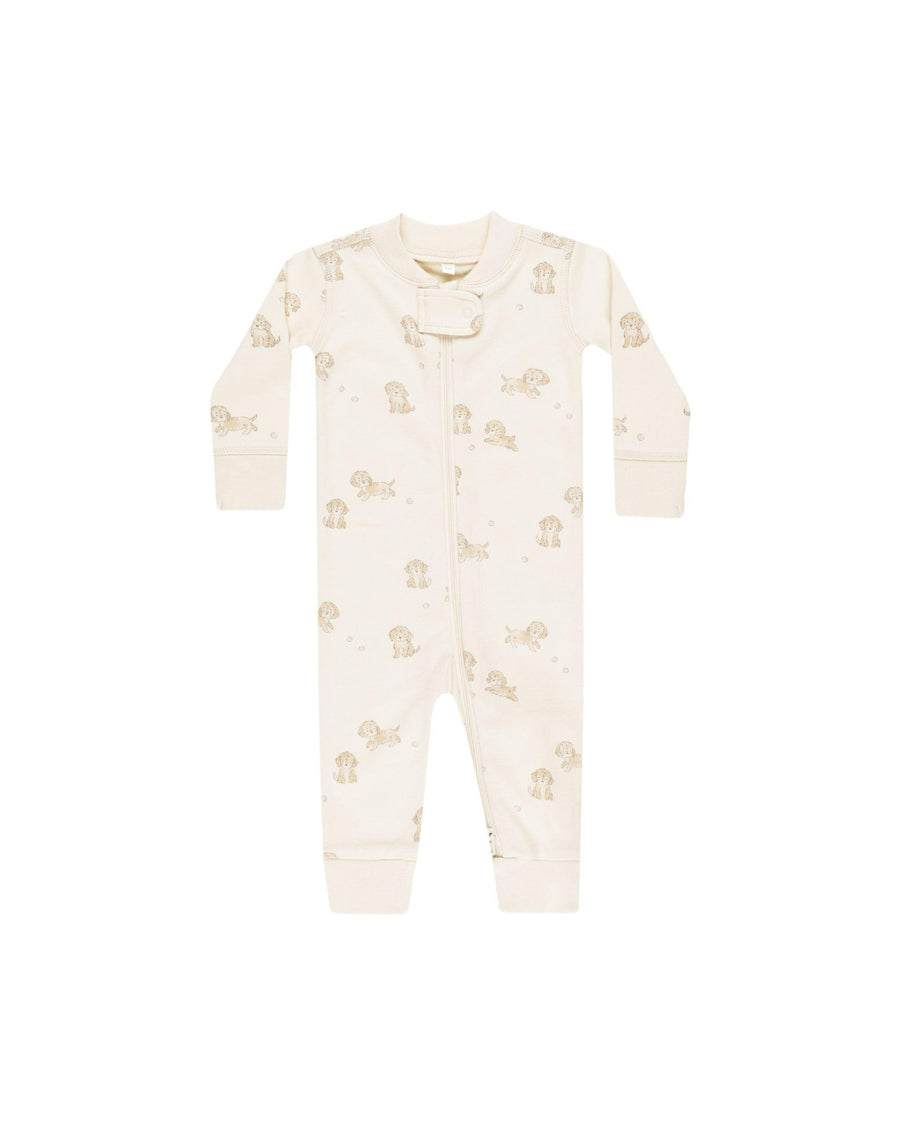 beige sleeper with zipper with flap at the top for zipper closure. tiny puppies printed all over it