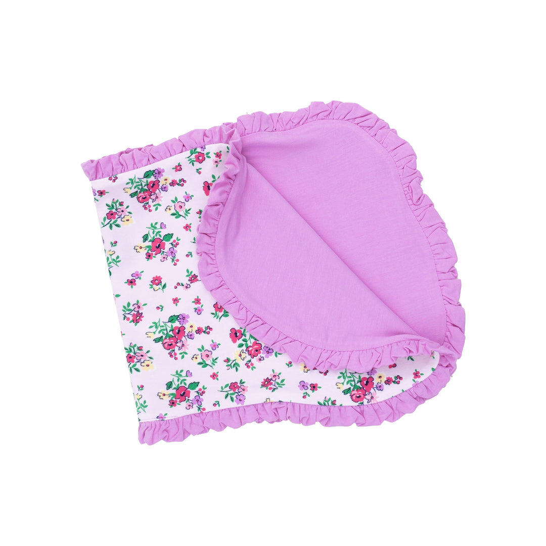 baby burp cloth lavender with magenta florals and purple ruffle around the burp cloth 