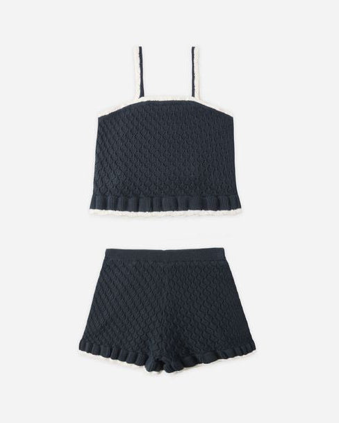 Navy ribbed crop top and shorts set on a white background