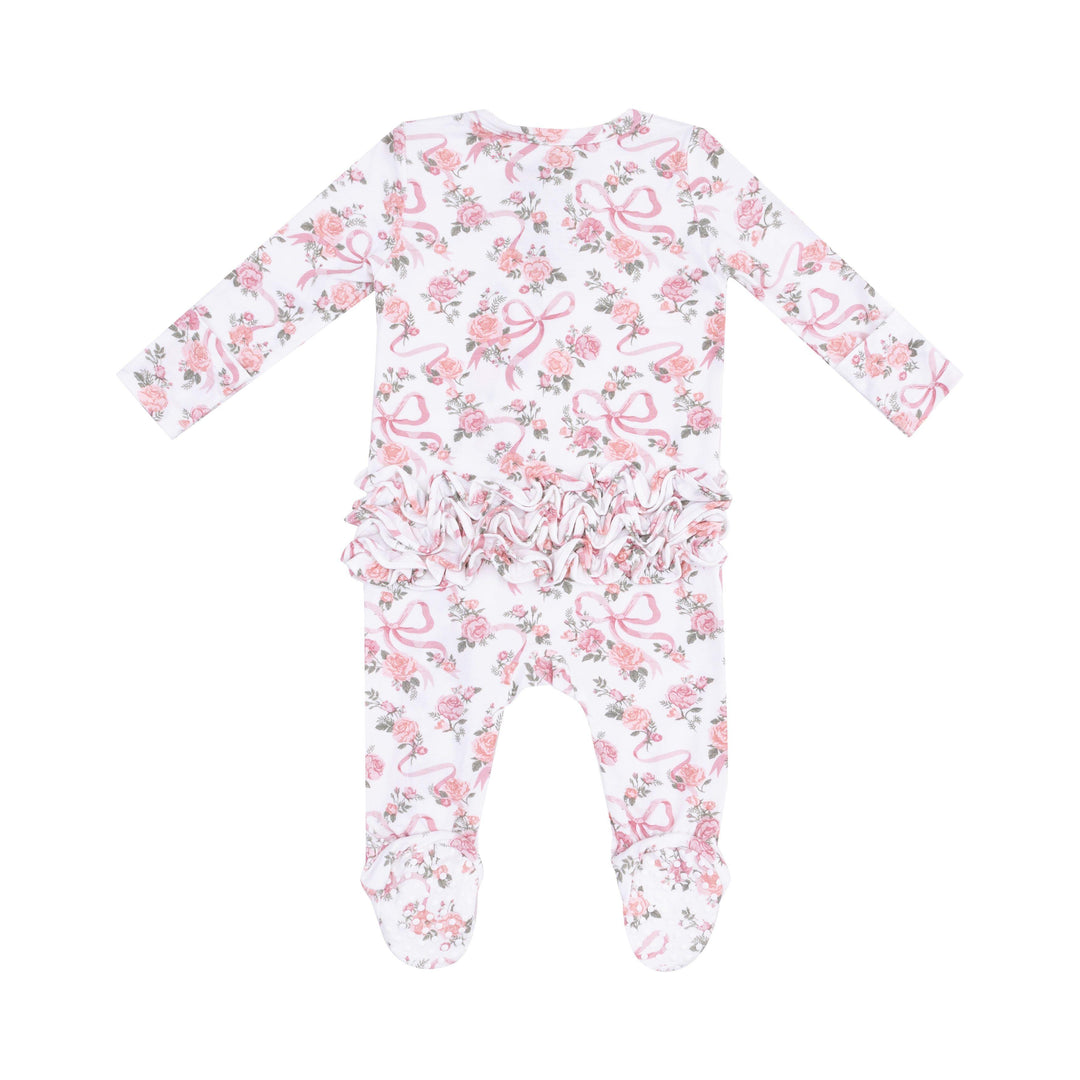 baby girl footie white background with pink roses and pink ribbons. ruffles on the bum. 