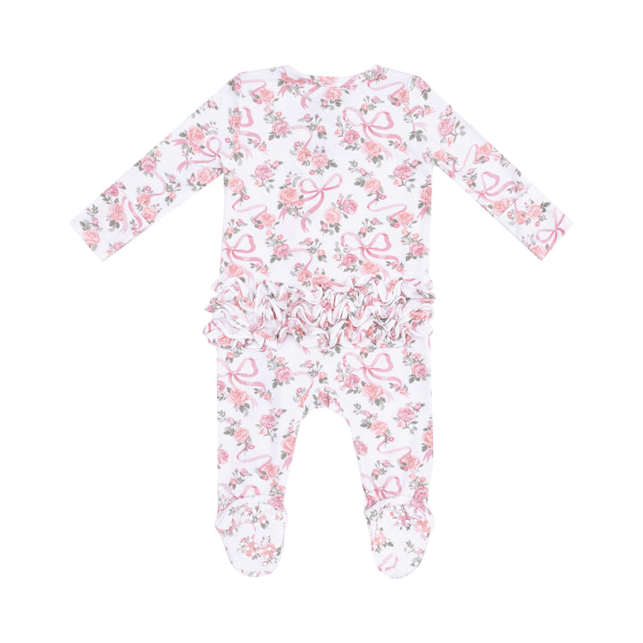 baby girl footie white background with pink roses and pink ribbons. ruffles on the bum. 