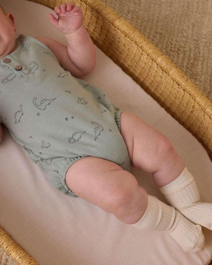 baby boy romper in green color with little dinosaurs all over. 
