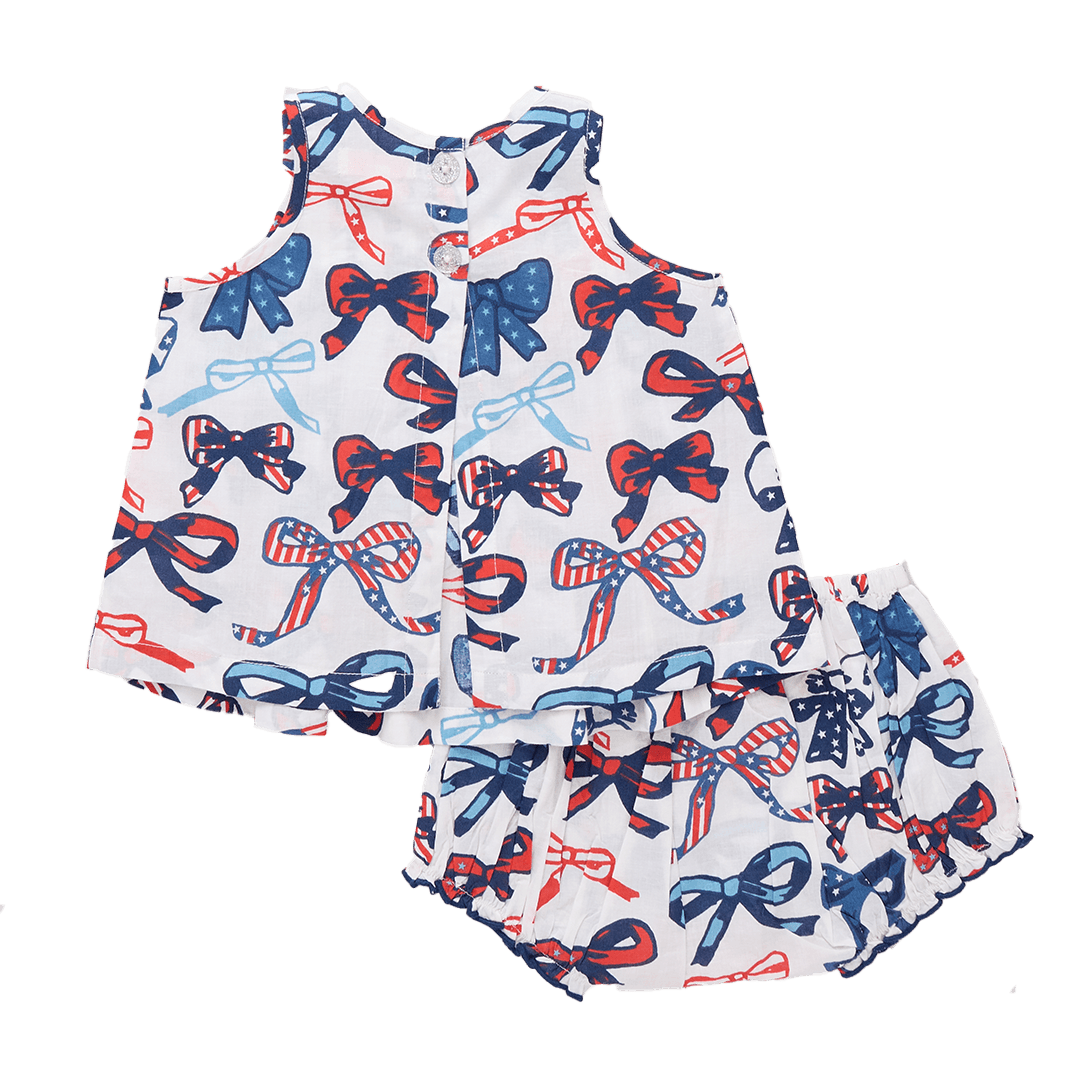 two piece baby set that has an open back with two buttons at the top of the blouse. 