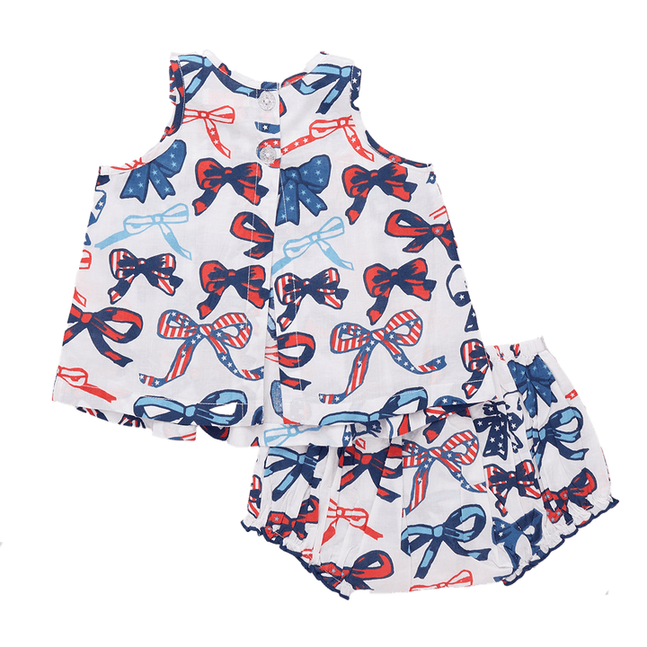 two piece baby set that has an open back with two buttons at the top of the blouse. 
