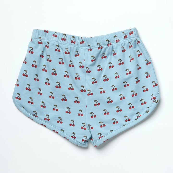 Light blue boxer briefs with cherry pattern on a white background