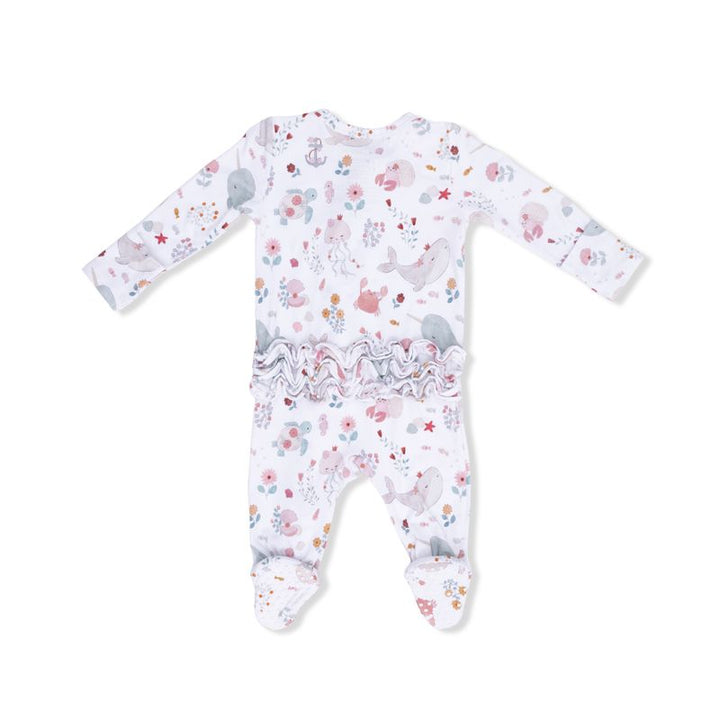 Back of Baby onesie with ruffles on the bum with a floral and sea animal pattern on a white background