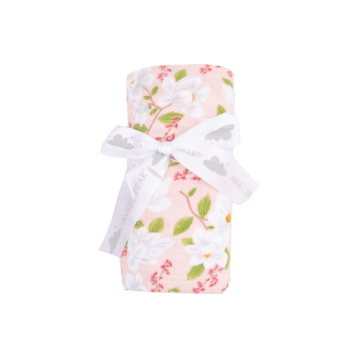baby magnolia swaddle rolled and tied, this is the way the swaddle is sold to a customer. 