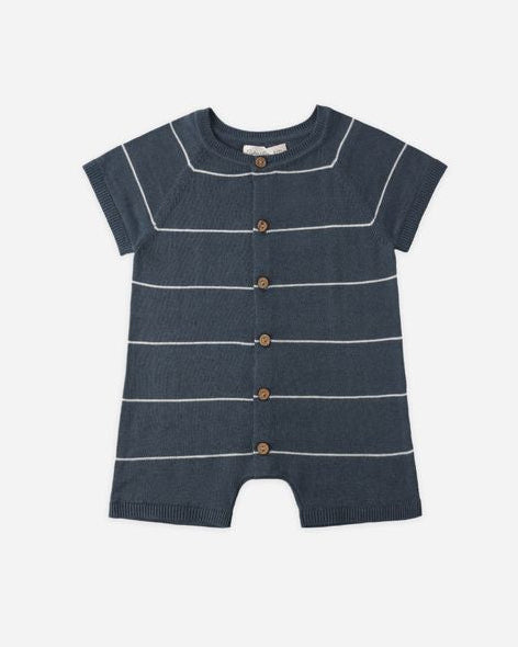 Navy blue romper with white stripes on a white background