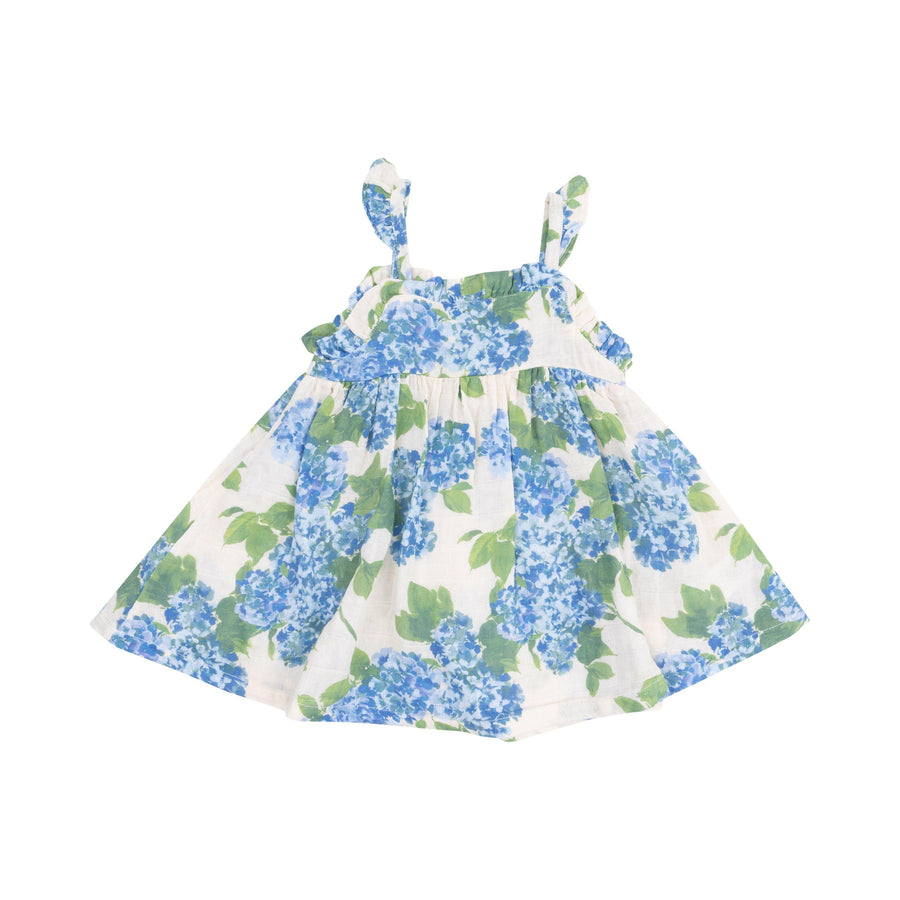 off white sleevess dress with ruffles at the straps with blue hydrengeas print. 