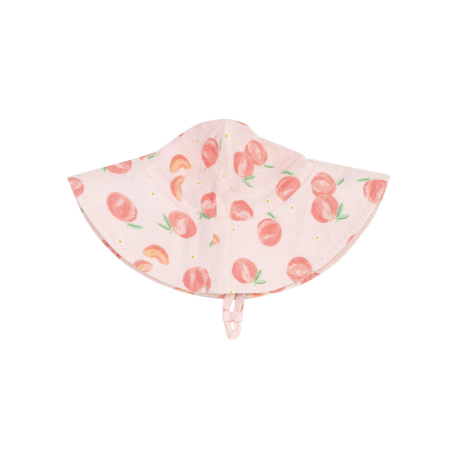peach wide brim sunaht with peaches whole and quarters on that hat.