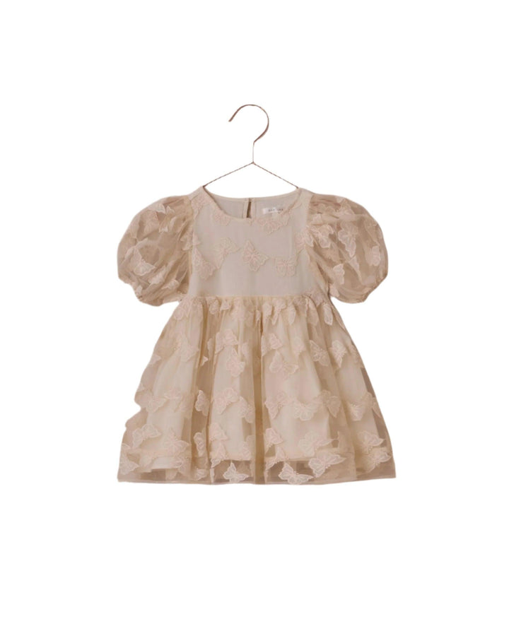 ivory dress with sheer layer of butteflies on it, textured. puff sleeves knee length