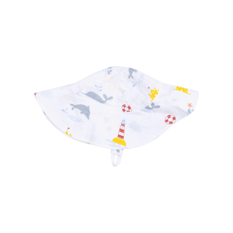 white wide brim sunhat with gray dophins and whales and a red and white striped lighthouse print on it.