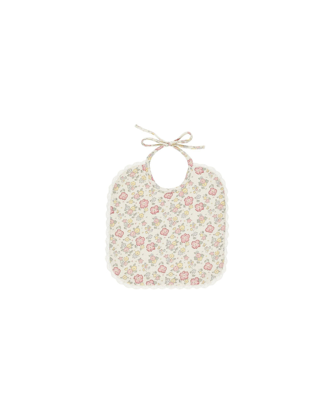 woven bib with tie at the neck in the bloom print  a pretty pastel floral. 