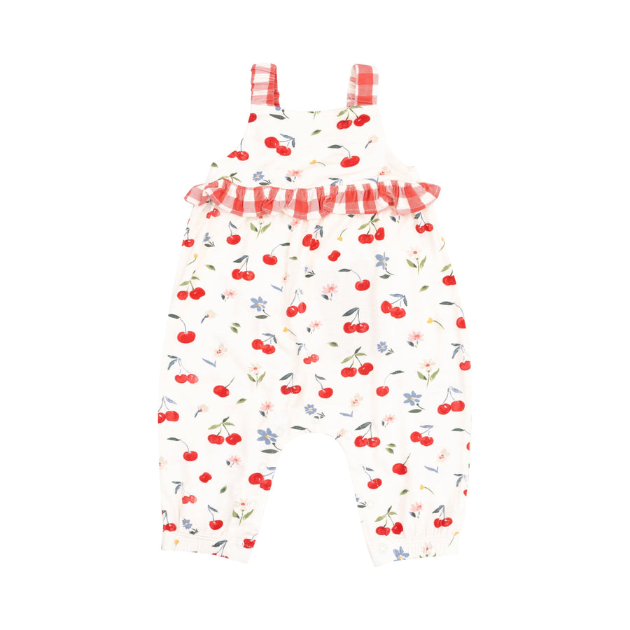 baby girl romper with watercolor cherries all over and red and white gingham straps. 