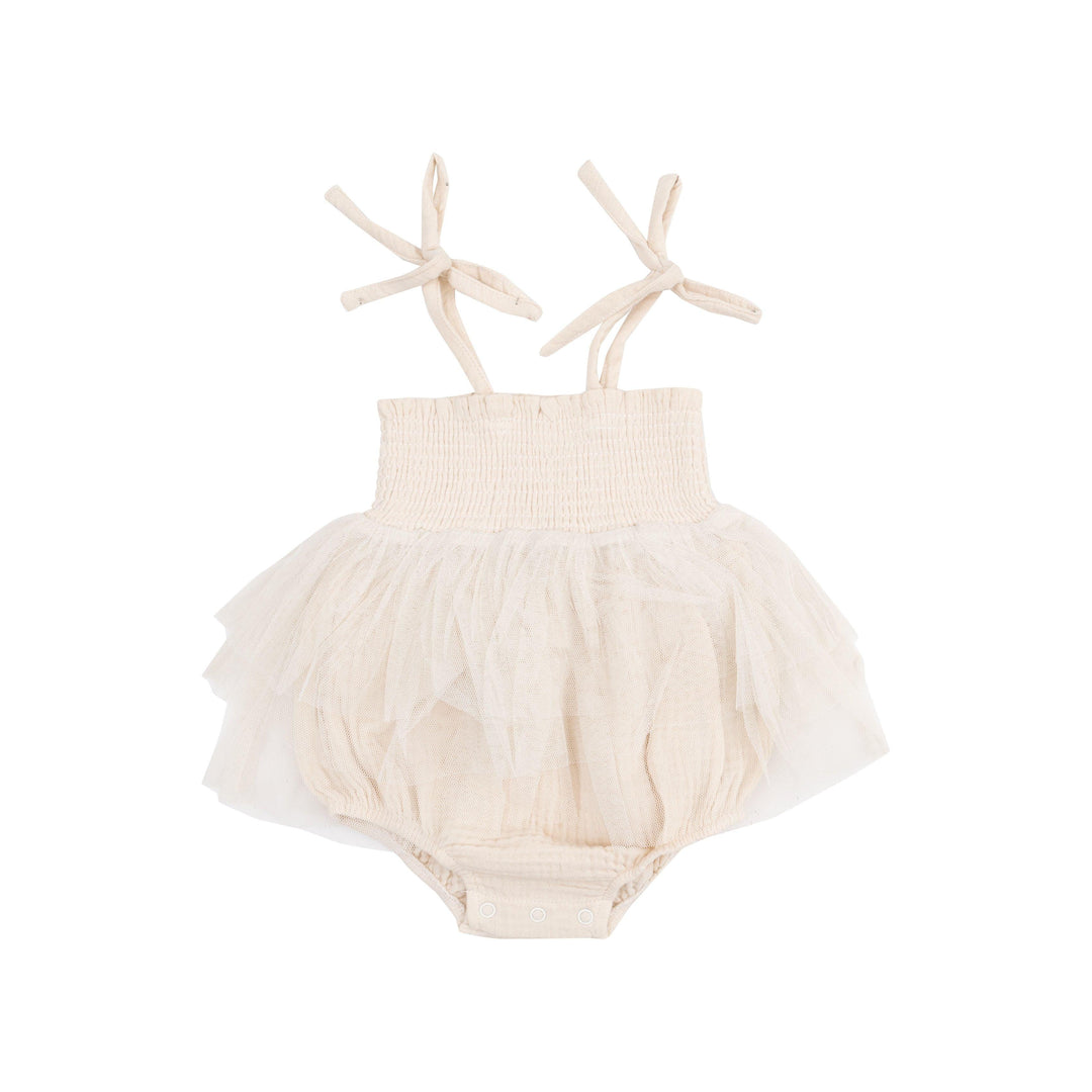 beige/white organic muslin smocked bubble with tutu skirt and straps that tie at the shoulder 