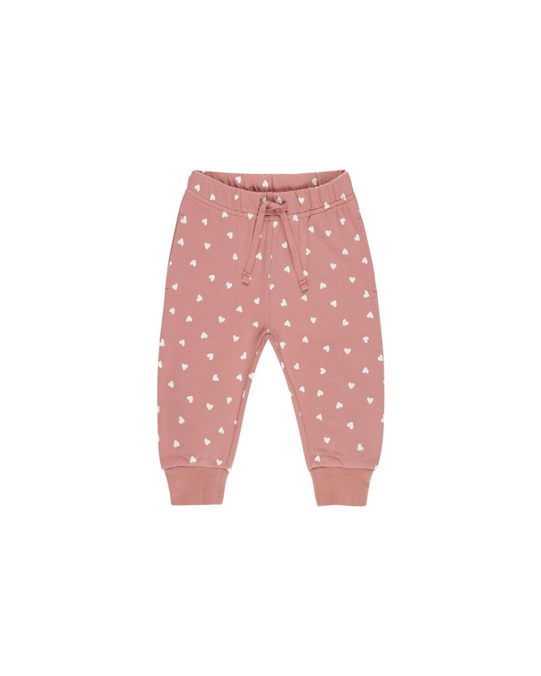 pink joggers with drawstring and tiny white hearts all over it. 