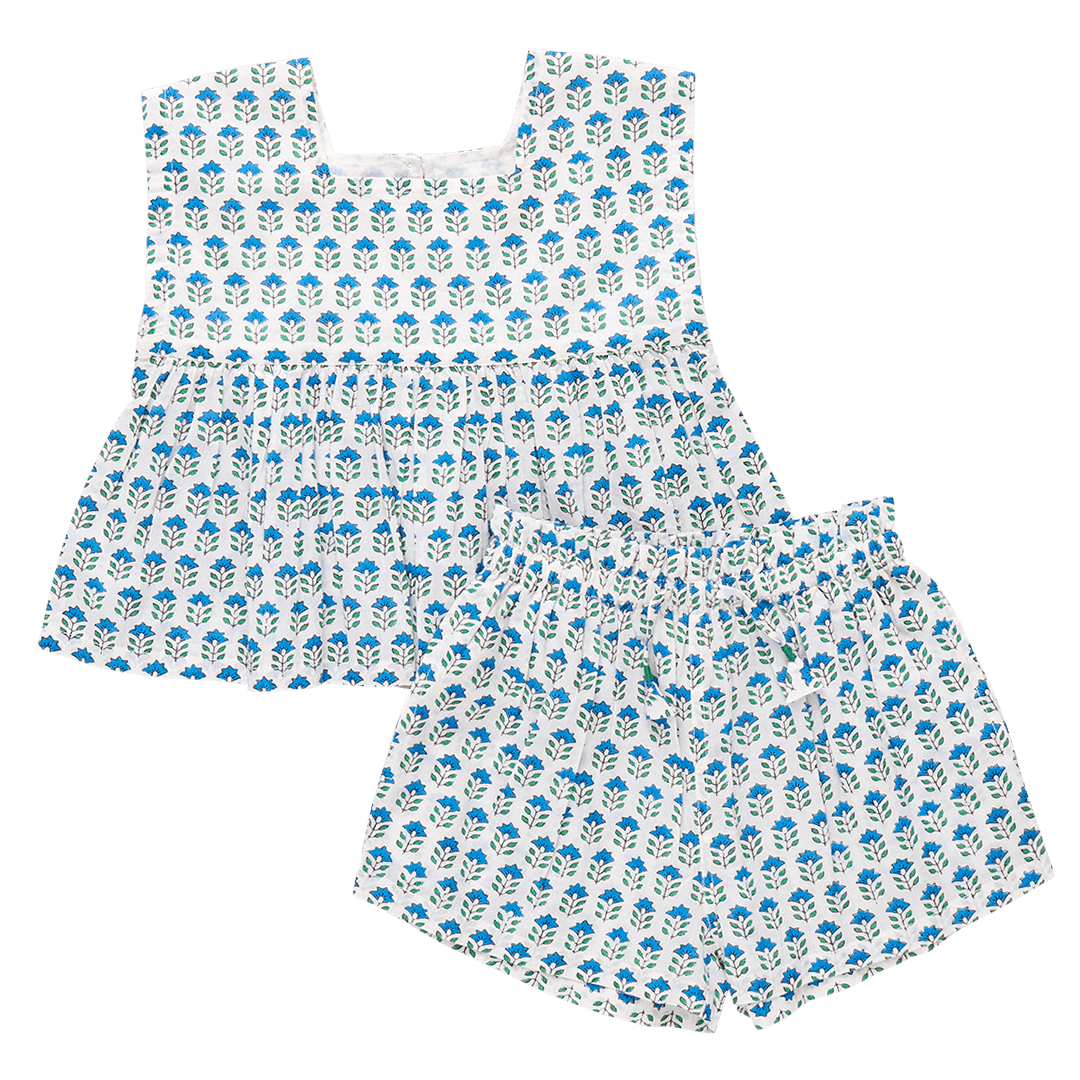 two piece girls set, white with tiny blue bohemian flowers and little green stems. top and shorts with elastic waist. 