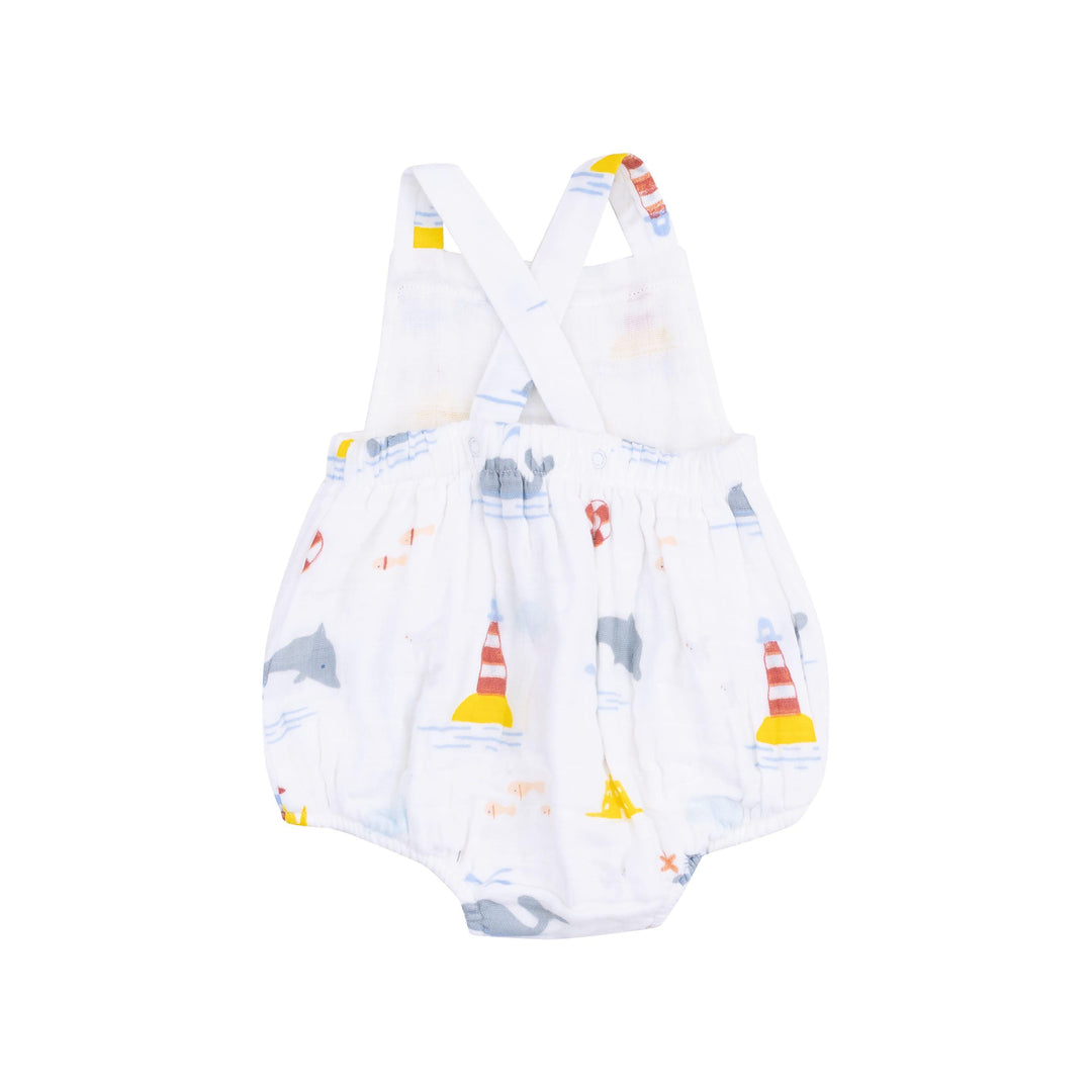 baby boy sunsuit with nautical theme on it including whales and dolphins. criss cross back. 