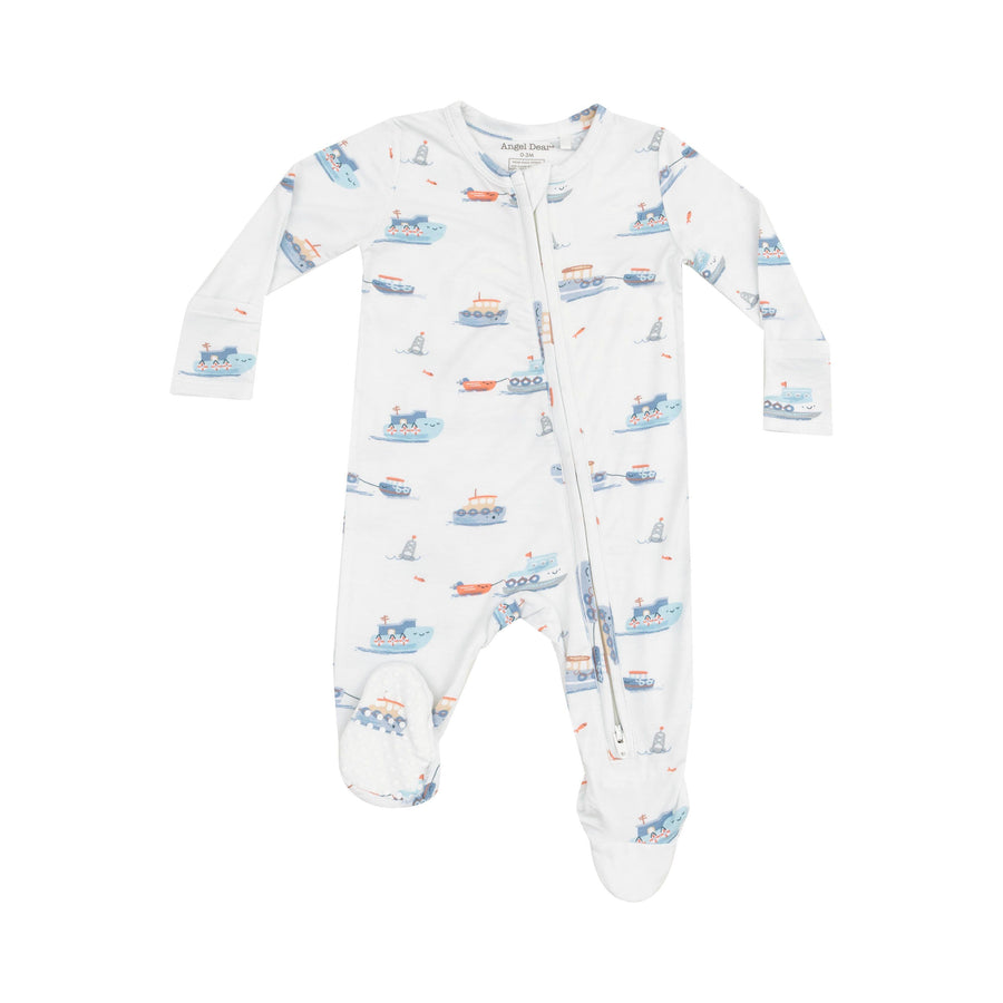 baby footie with blue and yellow tugbotas all over the footie.