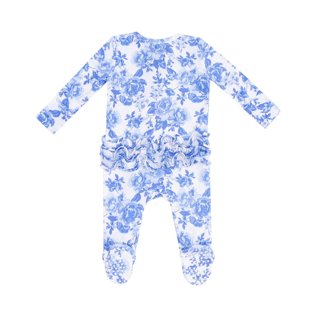 baby girl footie white with blue cabbage roses all over and ruffles on the bum. 