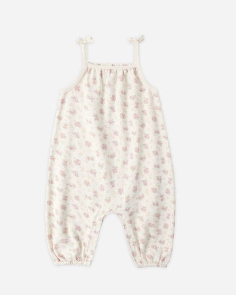 Floral-patterned baby romper on a white background