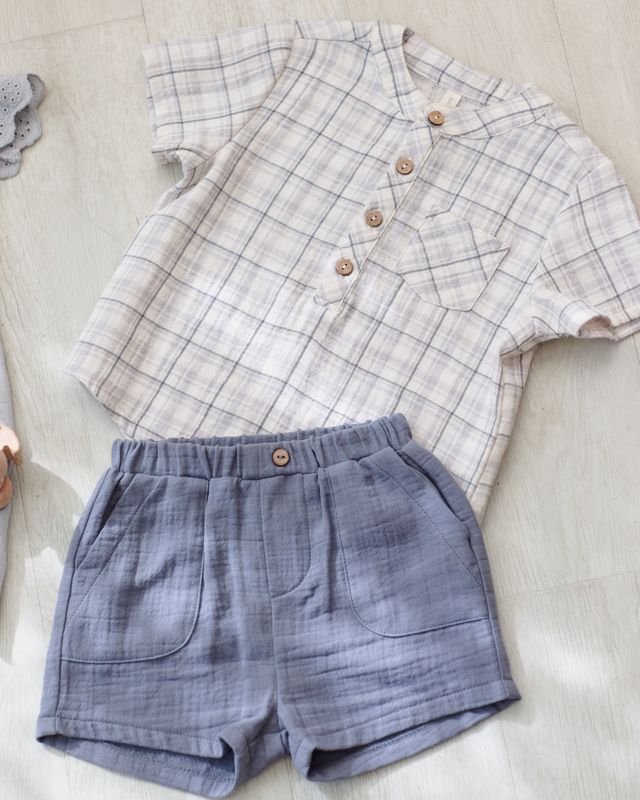 baby boy ourfit blue plaid shirt with blue elastic waist shorts. 