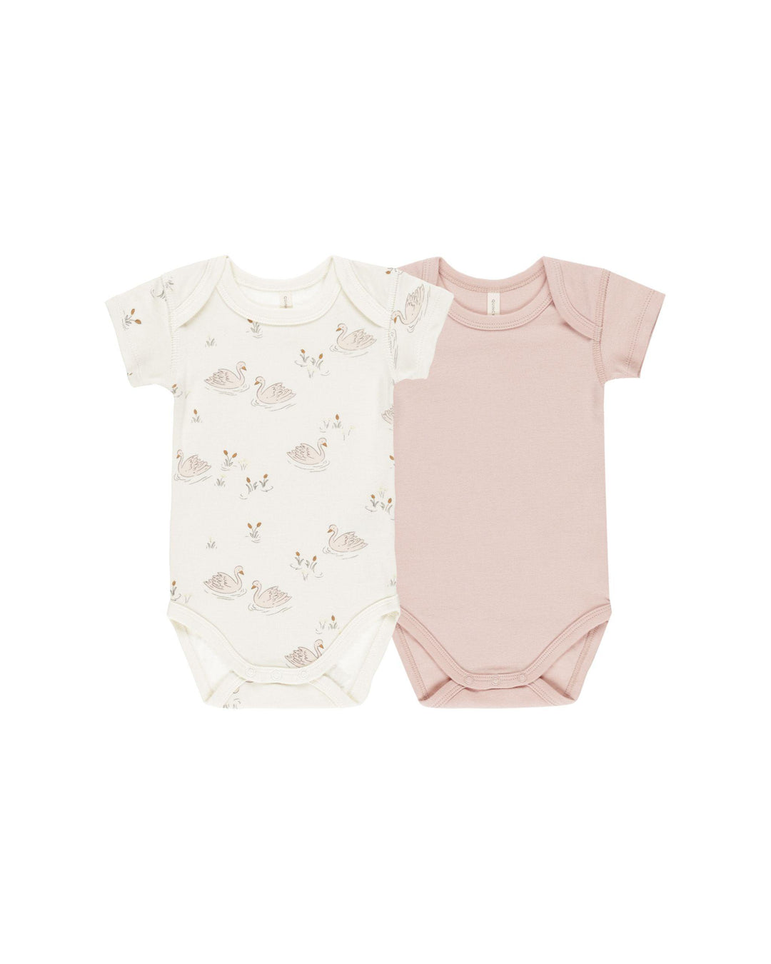 2 pack of bodysuits: one beige with swans printed all over it. the other is pink.