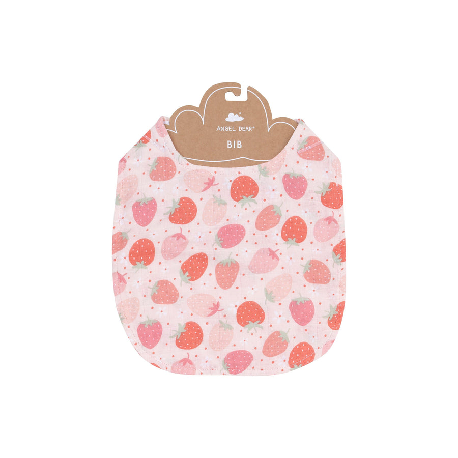 baby bib with pink and red strawberries on a light pink/peach ground. 