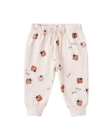 Baby pants with ladybug pattern on a white background