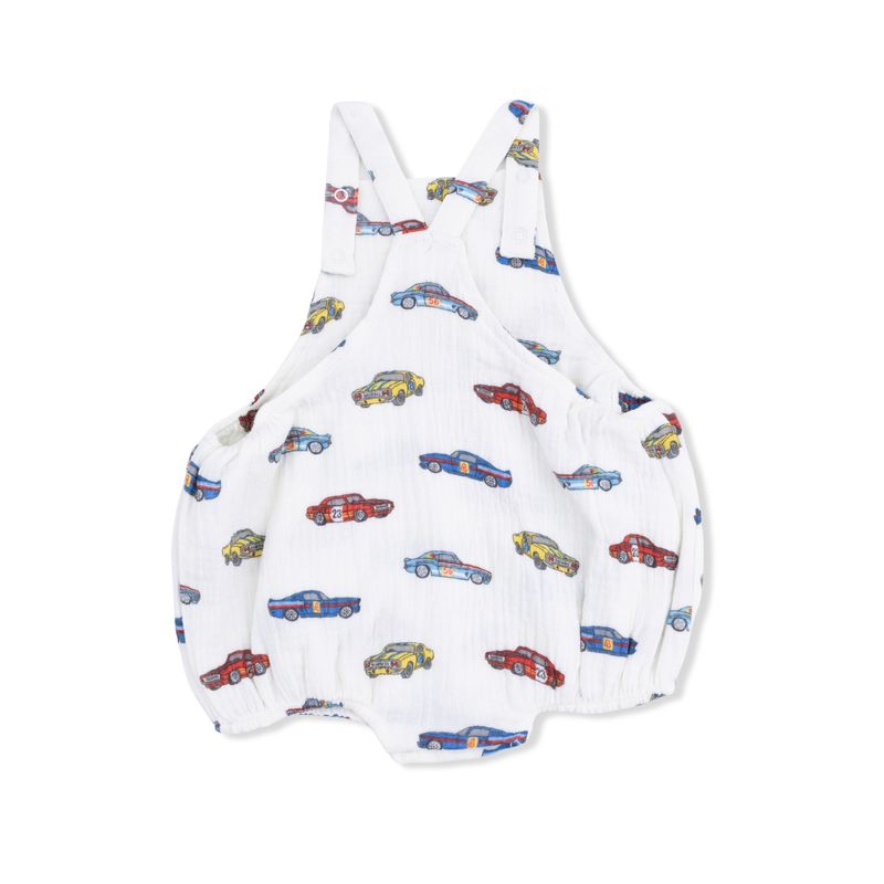 back of White baby romper with colorful car pattern on a white background
