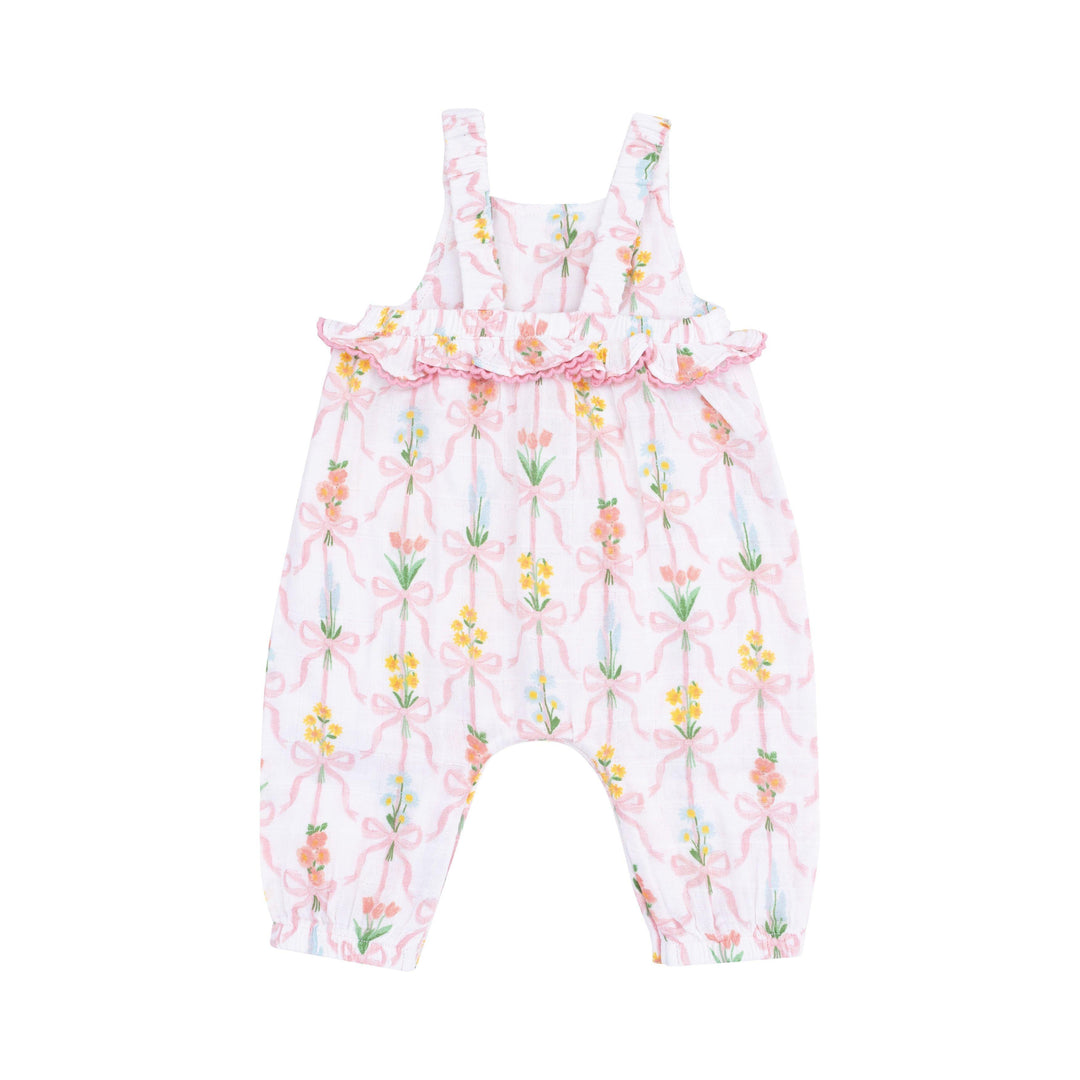 ruffle waist romper with criss cross straps with floral bouquets tied with ribbons 