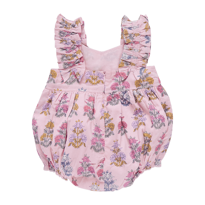 back of baby bubble pink in color with bohemian flowers all over the bubble. ruffled sleeves from front to back and zipper closure. 