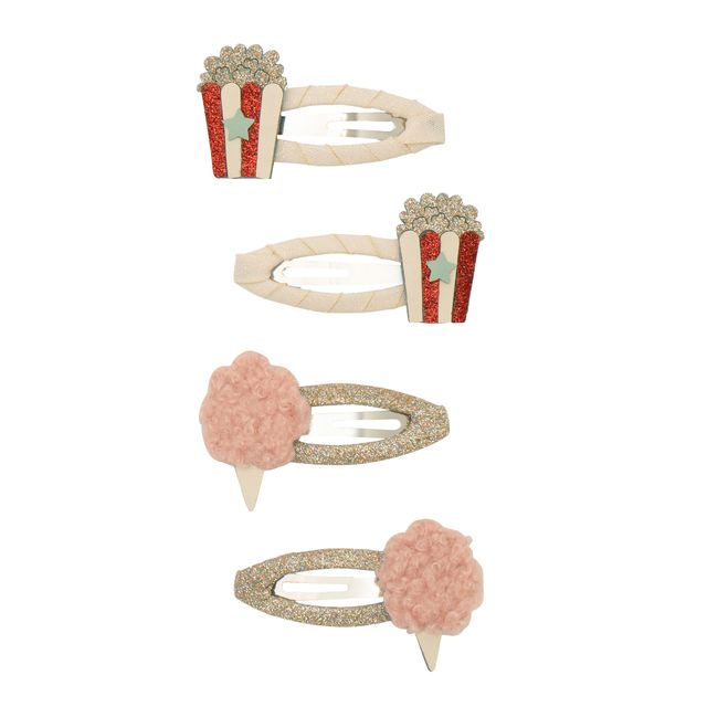 Set of four decorative hair clips with popcorn and ice cream designs on a white background