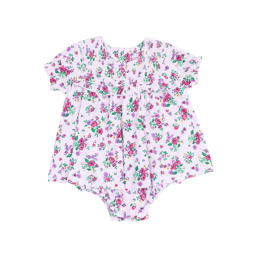 short sleece dress with an attached bodysuit, lavender color with dep pink and purple flowers all over the outfit. 