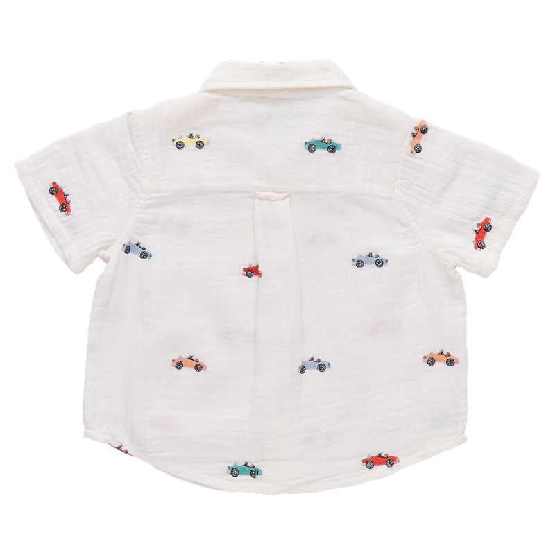 White shirt with small car patterns on a white background