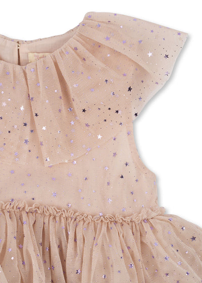 close up to the ruffle and stars all over the dress. 