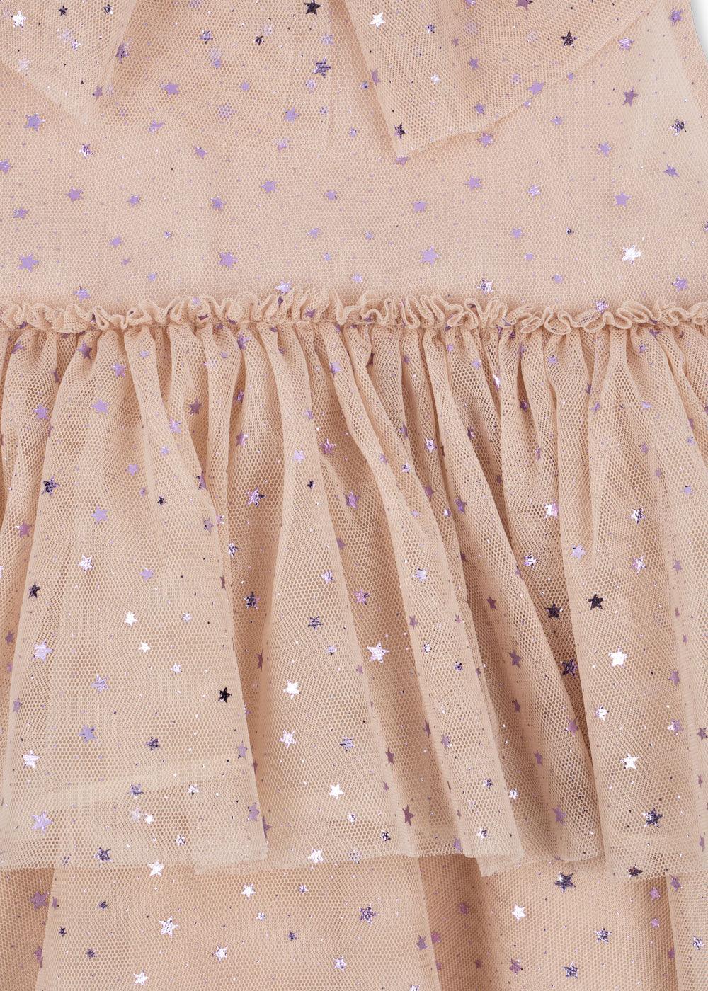 close up to the sparkle stars all over the dress. 