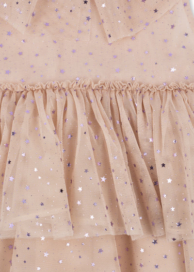 close up to the sparkle stars all over the dress. 