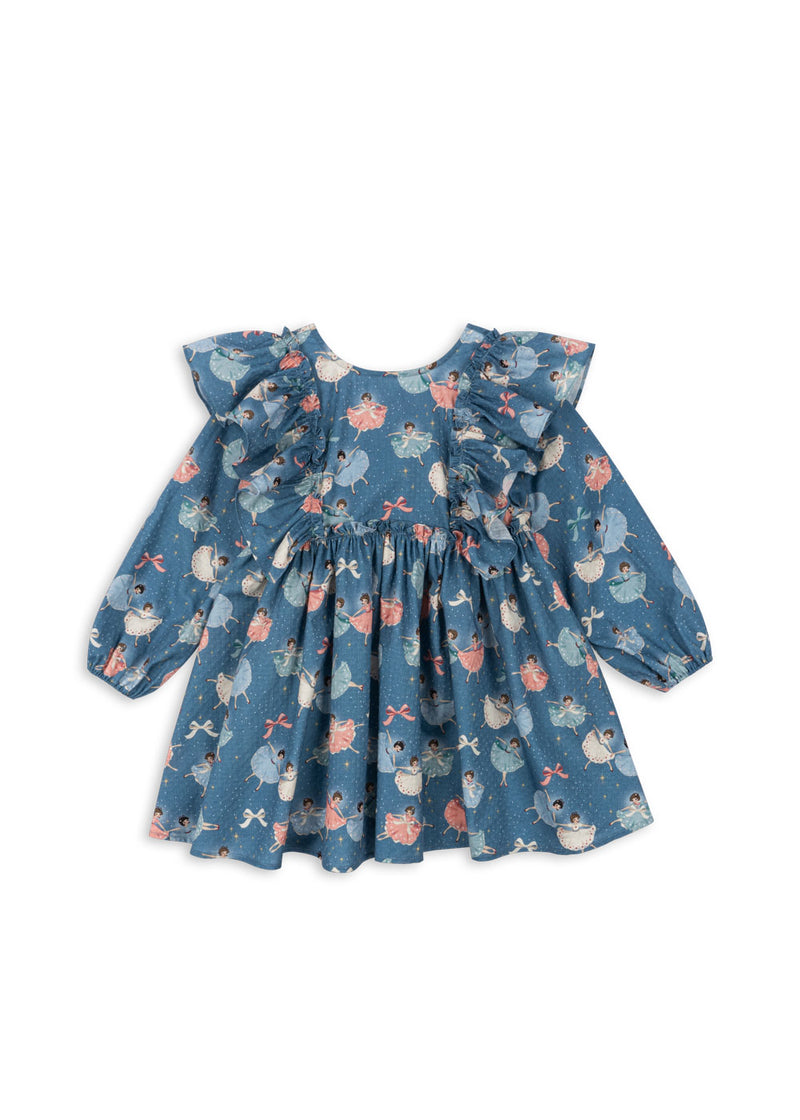 blue dress with ruffles coming down the front and vintage ballerinas all over the front of the dress. 