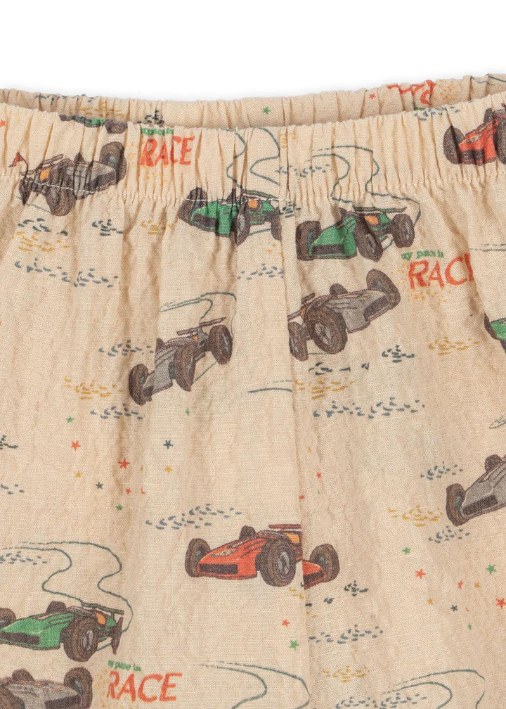 a close up of the print of the shorts and the elastic waist band. 