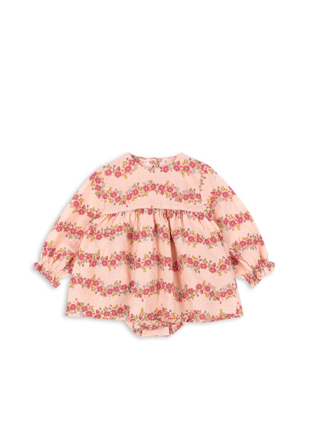 baby girls bodysuit with dress on top, long sleeves. with pink flowers and seersucker soft fabric. 