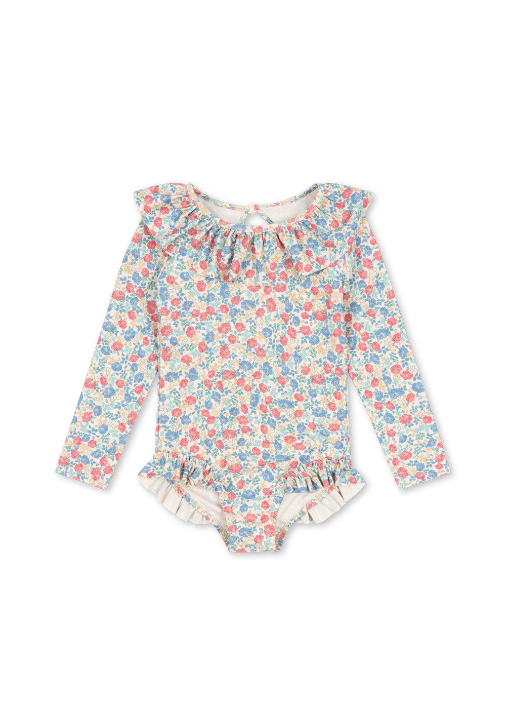 pastel floral rashguard bathing suit with ruffle around the neckline and ruffles at the leg opening. 