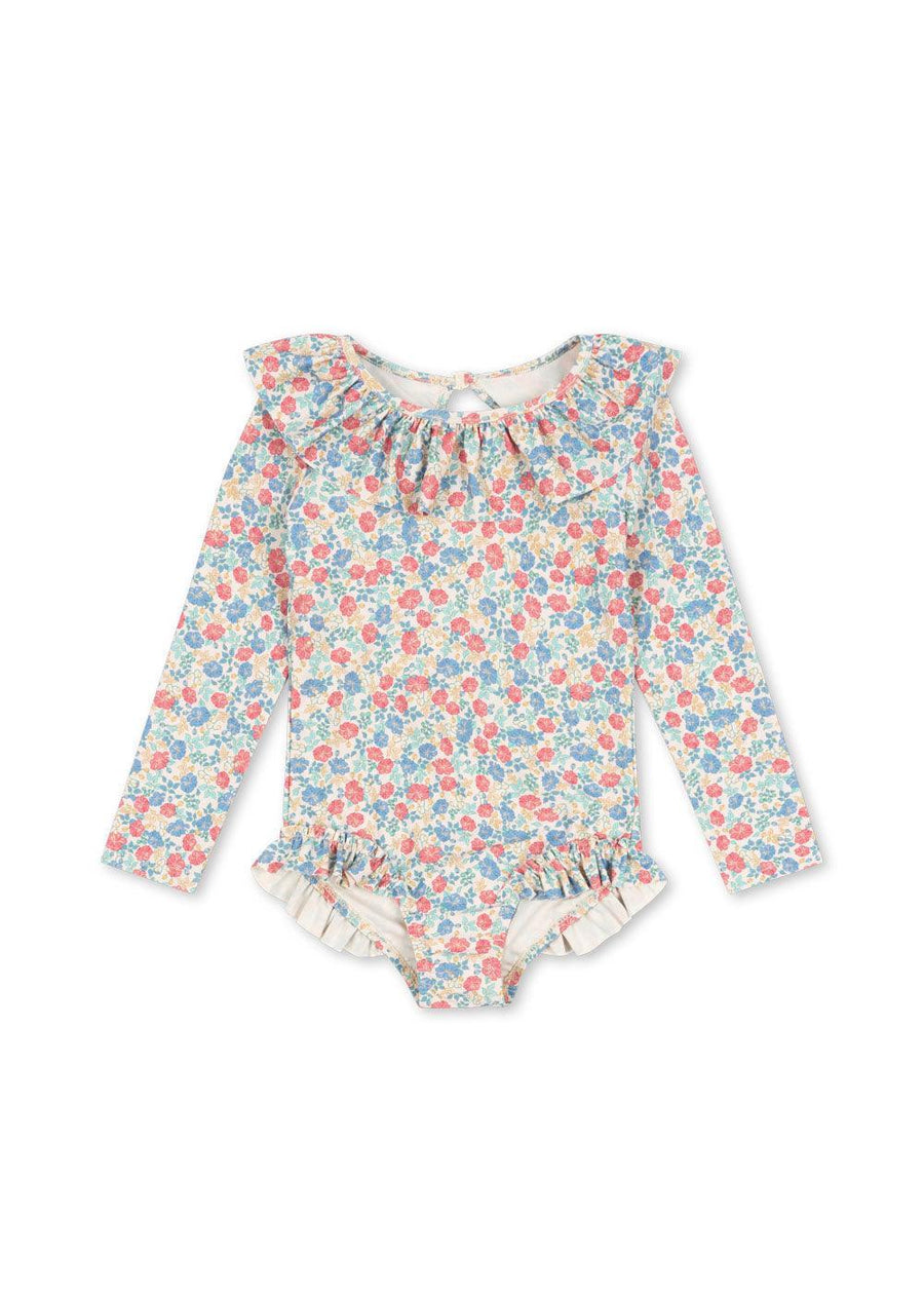 pastel floral rashguard bathing suit with ruffle around the neckline and ruffles at the leg opening. 