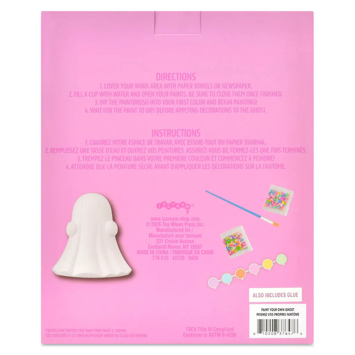 Back of a pink craft kit box showing directions, instructions, a white ghost-shaped piece, small example decoration packets, and a barcode label for a paint-your-own ghost product.