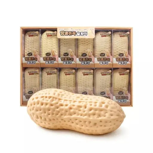 A novelty peanut-shaped object in the foreground with a box of similar packaged items behind it on a white background.