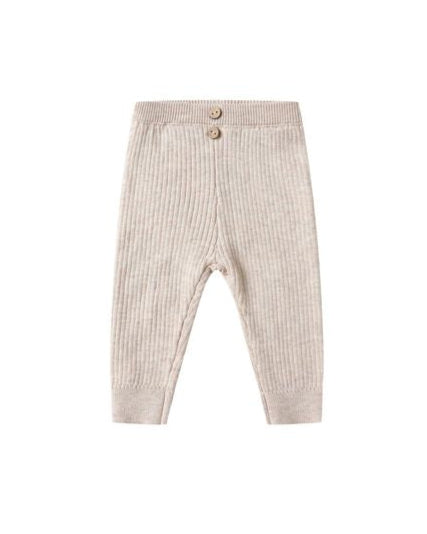 Beige rinned knit pants on a white background