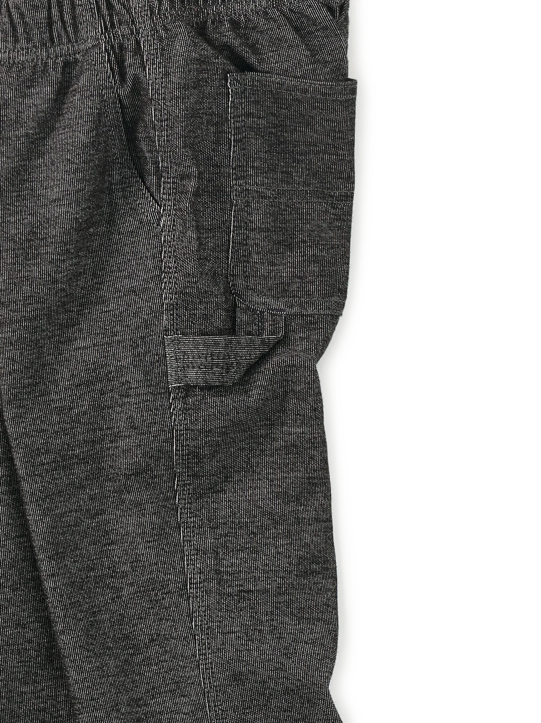 Close-up of dark heather gray pants showing a side pocket and elastic waistband on a white background.