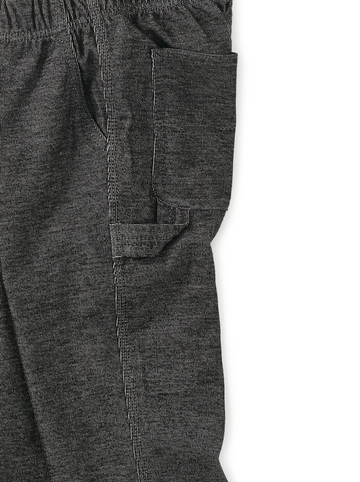 Close-up of dark heather gray pants showing a side pocket and elastic waistband on a white background.