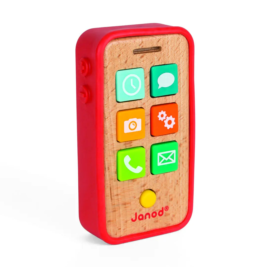 Toy phone with colorful buttons and red casing on a white background